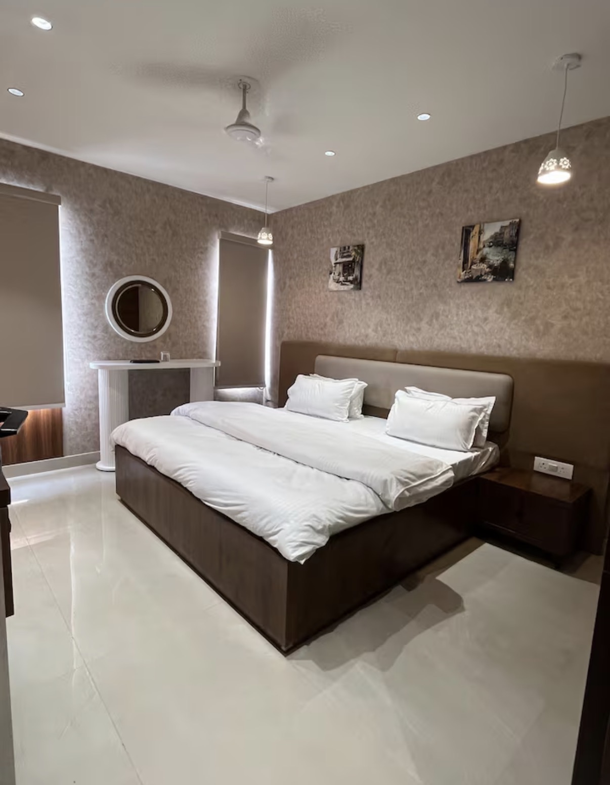 Master bedroom with designer pendant lighting — Dehradun