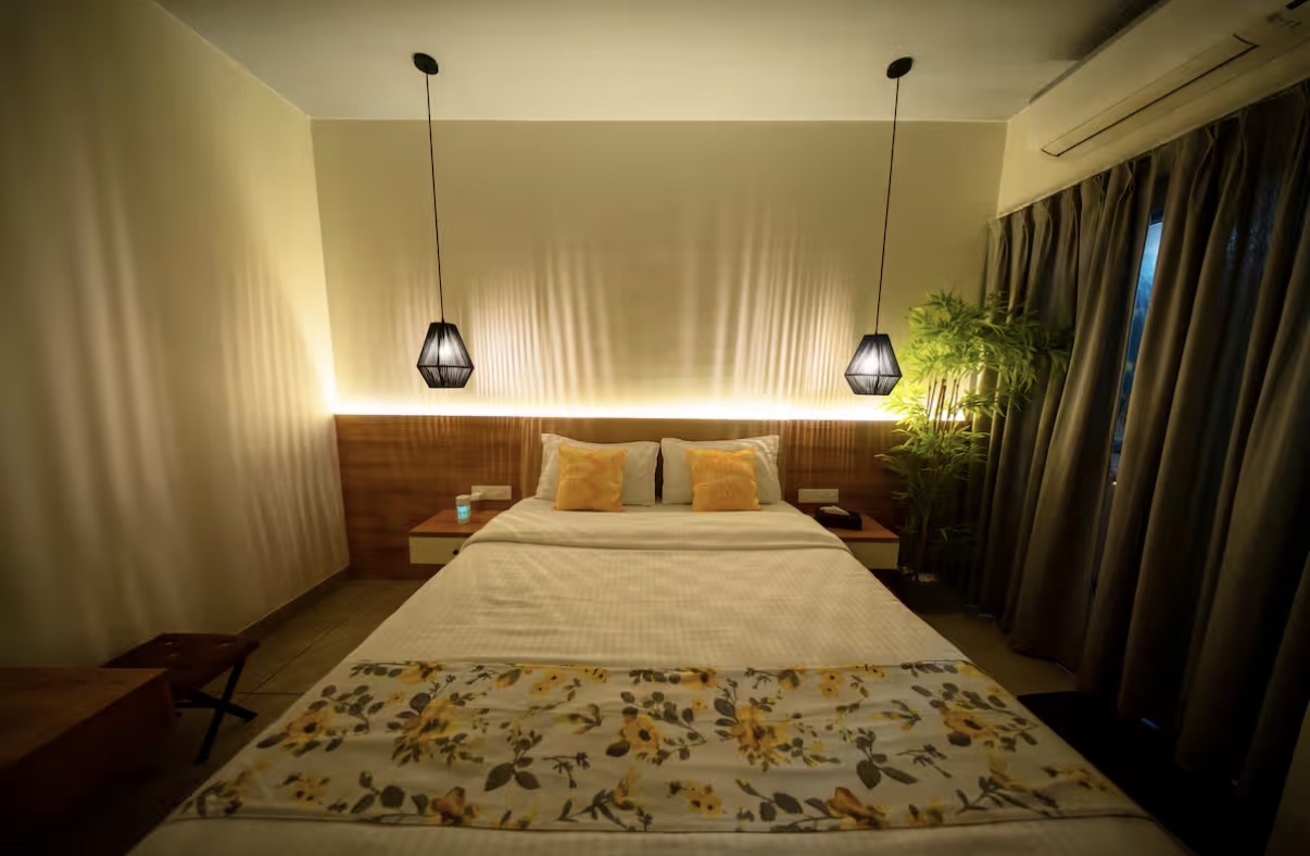 Master bedroom by night with warm backlit headboard